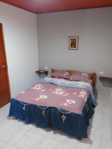 En eller flere senge i et værelse på Monoambiente céntrico