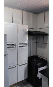 Η κουζίνα ή μικρή κουζίνα στο Kitnet 2