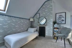 Ένα ή περισσότερα κρεβάτια σε δωμάτιο στο Seaside apartment