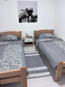 Ένα ή περισσότερα κρεβάτια σε δωμάτιο στο Sobe Potic +29 φωτογραφίες