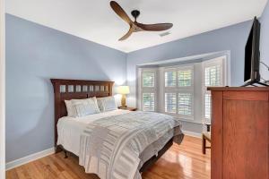 a bedroom with a bed and a ceiling fan at SI2638: 2638 Seabrook Island Road in Seabrook Island +37 photos