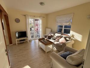 TV/trung tâm giải trí tại Barrierefreie Ferienwohnung nahe der Ostsee