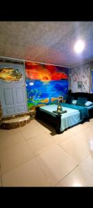 Voodi või voodid majutusasutuse Cabins yafeth osa drake bay toas