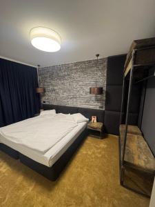 Postel nebo postele na pokoji v ubytování Monastery 2 Private Apartments