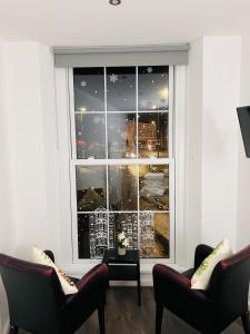 Un lugar para sentarse en Fox House Studios, City centre Aparthotel 76 fotos más