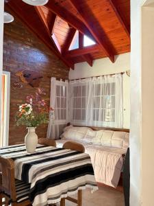 Postel nebo postele na pokoji v ubytování Cabañas Lomas del mirador