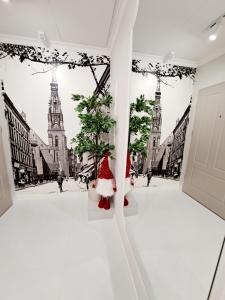 Postel nebo postele na pokoji v ubytování Poznaj Mickiewicza 1