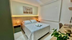 Una cama o camas en una habitación de Alto Padrão e Tranquilidade no Litorial Norte 16 fotos más