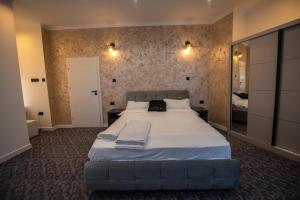 Voodi või voodid majutusasutuse Vibe90 apartament centru istoric toas