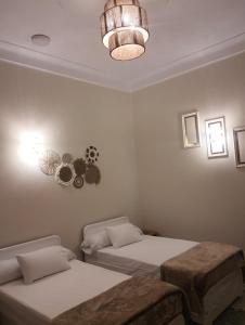 Ένα ή περισσότερα κρεβάτια σε δωμάτιο στο Wonji house +9 φωτογραφίες