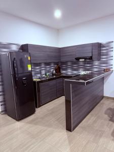 Η κουζίνα ή μικρή κουζίνα στο Casa encanto, jacuzzi privado & wifi