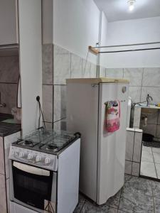 Køkken eller tekøkken på Apartamento espaçoso em Cuiabá