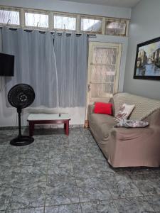 Et opholdsområde på Apartamento espaçoso em Cuiabá