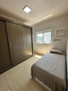 Postel nebo postele na pokoji v ubytování Ap Independecia