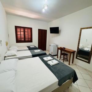 Postel nebo postele na pokoji v ubytování Pousada Circuito