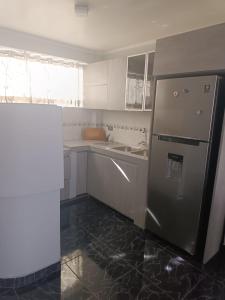 Η κουζίνα ή μικρή κουζίνα στο Puno- Departamento