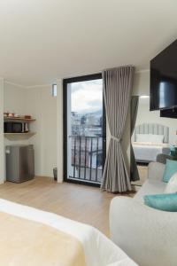 En eller flere senge i et værelse på Estancia del Alba + 44 billeder