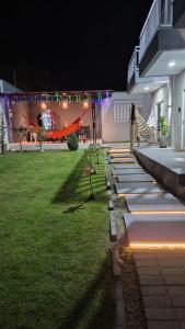 O grădină în afara Residencial New Stilo-Falésia