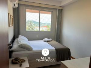 En eller flere senge i et værelse på Nautilus Refúgio da Alegria - Penha/SC + 53 billeder