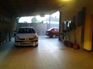 a car parked in a parking lot in a garage at Casa Rodisa in Turda +17 photos