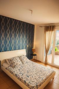 Postel nebo postele na pokoji v ubytování KazaFelicia-Villa avec piscine privée et vue mer