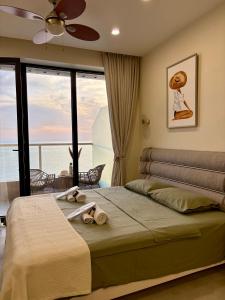 Ένα ή περισσότερα κρεβάτια σε δωμάτιο στο Sea View Dream Apartment in BambooBeach Tsikhisdziri