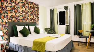 Postel nebo postele na pokoji v ubytování Le Ti Marinois 6