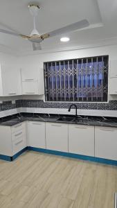 Η κουζίνα ή μικρή κουζίνα στο The Badawu Residence