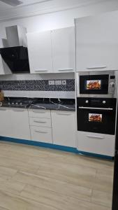 Η κουζίνα ή μικρή κουζίνα στο The Badawu Residence