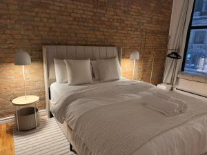 Postel nebo postele na pokoji v ubytování Top Location - The 777 Old Port Gem + 17 fotografií