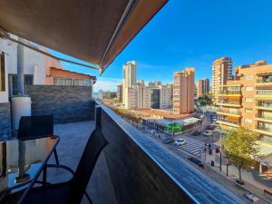 a balcony with a view of a city at Apartalux Ático Jaime I in Benidorm