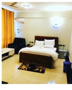 Ένα ή περισσότερα κρεβάτια σε δωμάτιο στο The Planet Hotel