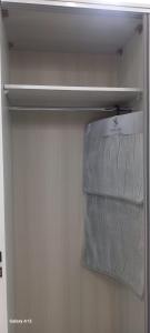 a shelf in a refrigerator with a plastic bag on it at غزو 15 in Aydūn +3 photos