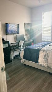 Giường trong phòng chung tại Presidium Tech Ridge