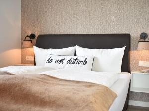 Ένα ή περισσότερα κρεβάτια σε δωμάτιο στο Watt'n Flair Hohe Düne