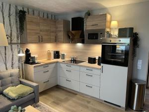 Η κουζίνα ή μικρή κουζίνα στο Holiday apartment Has 26 APP links