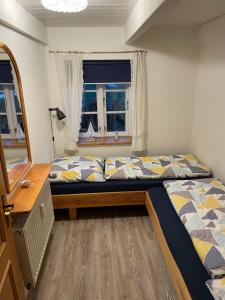 Giường trong phòng chung tại Friesenhaus Westerschütting