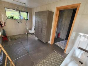 Ένα μπάνιο στο 9 person holiday home in Øverbygd +22 φωτογραφίες