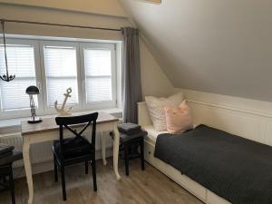 Ένα ή περισσότερα κρεβάτια σε δωμάτιο στο Holiday home in Büsum with swimming pool