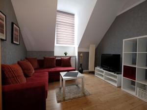 Μια τηλεόραση ή/και κέντρο ψυχαγωγίας στο Holiday apartment in Mayen with Wi-Fi