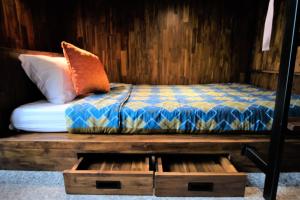 Ένα ή περισσότερα κρεβάτια σε δωμάτιο στο Cha Li's Family Hotel&Hostel