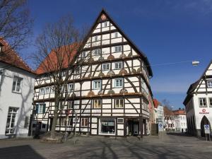 an old building in the middle of a city at Holiday apartment with 1 bedroom in Südrandweg