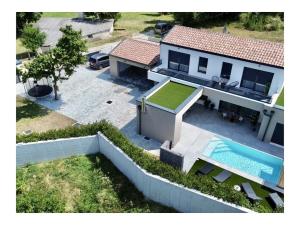 an aerial view of a house with a swimming pool at Villa in minj with swimming pool in Žminj