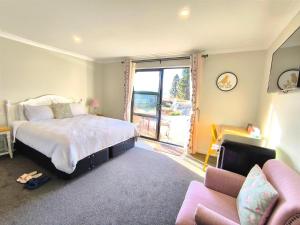 En eller flere senge i et værelse på Lakeside Garden Stars - 3 Bedrooms