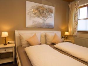 Ένα ή περισσότερα κρεβάτια σε δωμάτιο στο Guesthouse Trostelhof 1