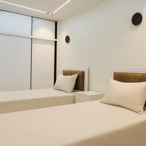 Ένα ή περισσότερα κρεβάτια σε δωμάτιο στο Modern Luxury Apartment 3 Min from Algiers Aiport