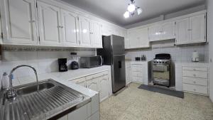 Kuchyň nebo kuchyňský kout v ubytování Casa Linda