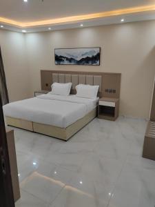 Postel nebo postele na pokoji v ubytování فندق الضيافة