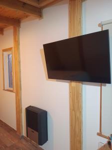 Et tv og/eller underholdning på Rincón del Shoam + 4 billeder