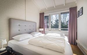 Ένα ή περισσότερα κρεβάτια σε δωμάτιο στο Beautiful Apartment In Schiermonnikoog